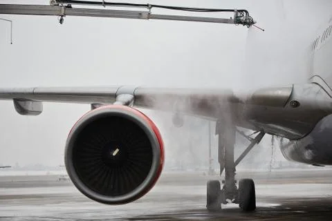 Deicing of the airplane Stock Photos
