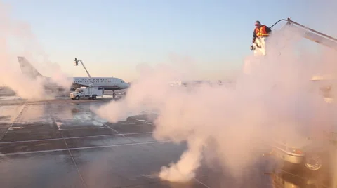 Deicing Jet in Preparation for Hazardous Weather Stock Footage