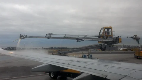 Deicing A Passenger Aircraft Wing Stock Footage 99181286