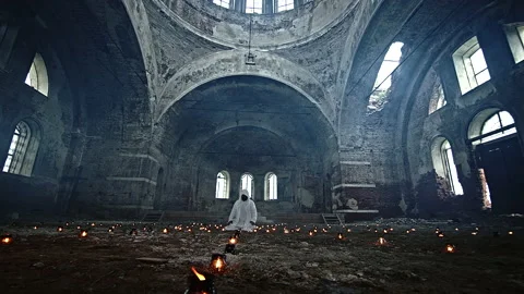 Deity in the middle of a ruined temple Stock Footage 168490665