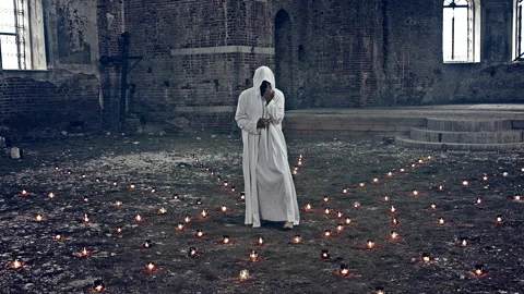 Deity in the middle of a ruined temple Stock Footage 168490828