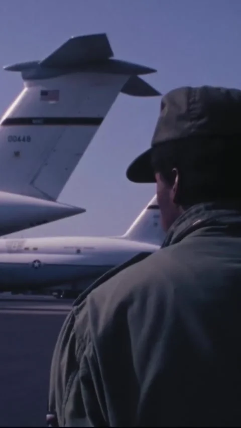 DELAWARE - 1973 - USAF airmen work as air traffic control for cargo planes Stock Footage 342667595