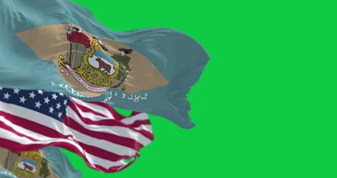 Delaware and US flags waving isolated on green background Stock Footage 313739340