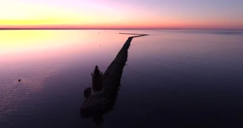 Delaware Breakwater Lighthouse during sunset, aerial drone shot Stock Footage 143206447