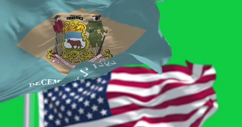 Delaware state flag waving with the US flag isolated on green background Stock Footage 293180694