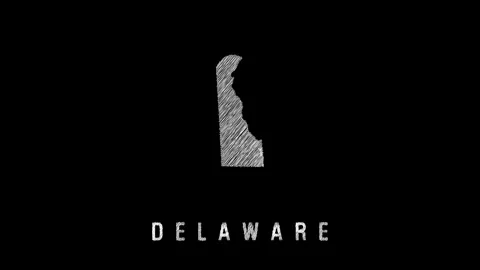 Delaware state shape appearing with pencil scribble effect on black background Video stock 314728821