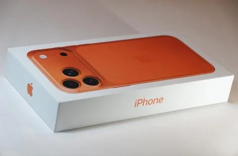 Delaware, U.S - Dec 24, 2025 - The orange iPhone 17 Pro Max box with triple.. Stock Photos
