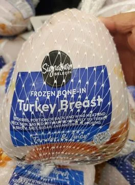 Delaware, U.S - Oct 29, 2025 - The Signature Select Frozen Bone-In Turkey B.. Stock Photos