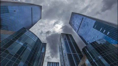Delay in the transition from cloudy to sunny in high-rise buildings Stock Footage 273534379