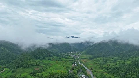Delayed cloud and mist in rural green mountains Stock Footage 282239856