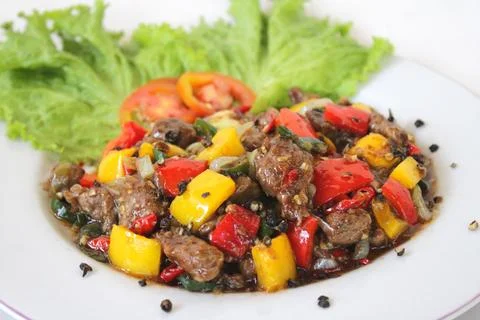 Delectable Black Pepper Beef Stir-Fry with Colorful Peppers Фото