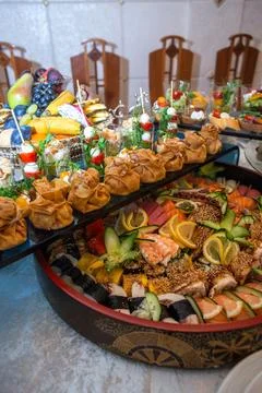 Delectable buffet spread of seafood, sushi, salads, fruit, and pastries. Foto stock