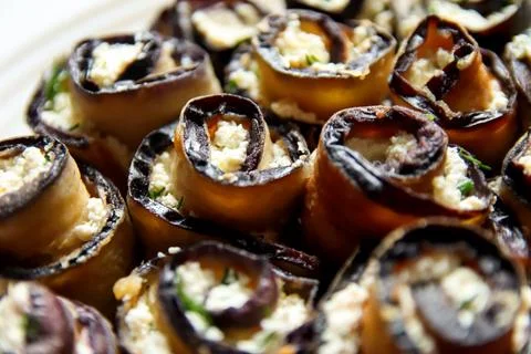 Delectable eggplant rolls Parmesan. This appetizer features grilled eggplant Stock Photos