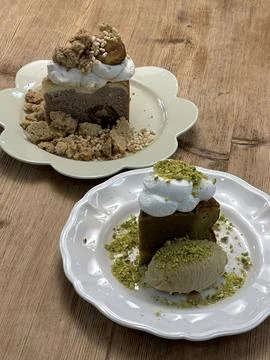 A delectable slice of cake with rich layers of cream and frosting, topped w.. Stock Photos