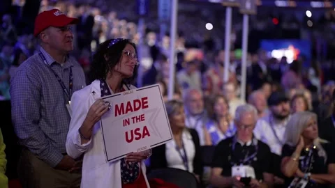 A delegate holds a 'Made in the USA' sign, RNC Dallas 2026 Stock Footage 345271784