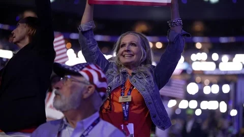 A delegate raises her arms and cheers, RNC Dallas 2026 Stock-Footage 345271661