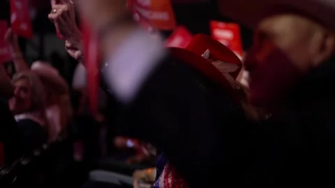 A delegate in a red cowboy hat on the convention floor, RNC Dallas 2026 Stock Footage 345272059