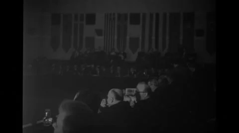 Delegates seated at their tables in the conference room at Nato Conference Stock Footage
