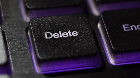Delete button macro shooting the led light blue and red buttons keyboard Stock Footage 130205188