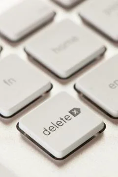 Delete button on a white and grey computer keyboard Stock Photos