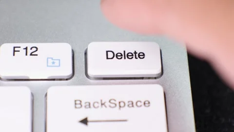 Delete key press close-up on keyboard Stock Footage 347387995