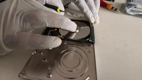 The deleted data is being repaired by the technician on the hard disk Video stock 247817943