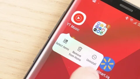 Deleting an App on a Smartphone Display Closeup Stock Footage 107158747