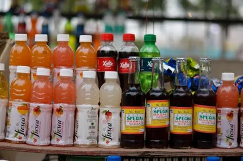 Delhi, India, 2020. Indian cold drink juices kept for display at a vendor Stock Photos