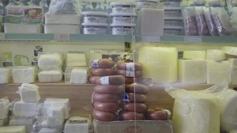 Deli shop with assorted cheeses on display. Stock Footage 225661313