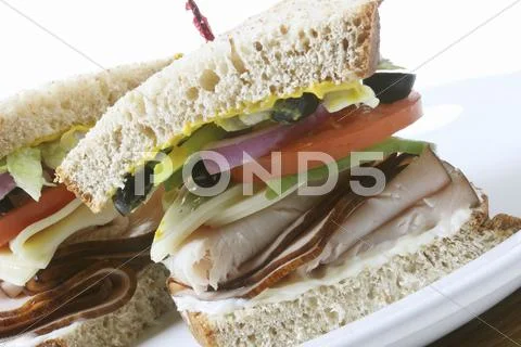 Deli Turkey Sandwich Halved with Toothpick Stock Photos
