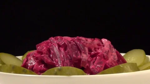 Delicate and delicious salad of beet and cucumber. Stock Footage 70643079