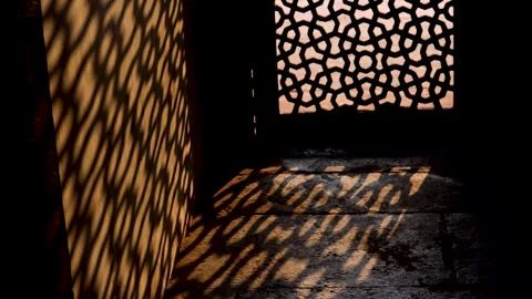 The delicate and intricate patterns created by the stone lattice emitted Glow Stock Footage 261555744