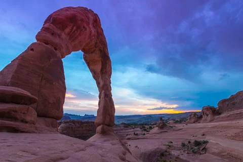 Delicate arch after sunset Stock Photos