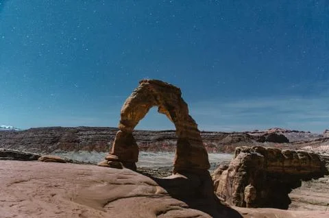 Delicate Arch at Arches National Park Night Photo with Stars on a full moon day Stock Photos