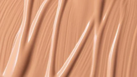 Delicate beige smeared texture of BB face cream, tonal foundation is smudged. Stock Photos