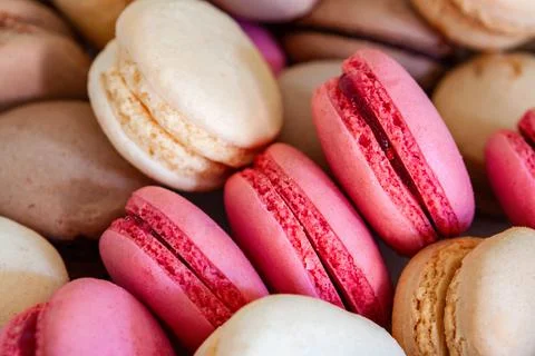 Delicate chocolate, coffee and raspberry french macaroons Stock Photos