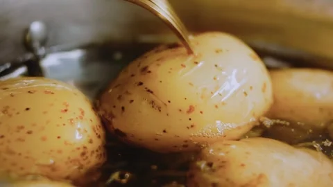 Delicate close ingredient view: preparing potatoes for a spicy salad Stock Footage 342198249