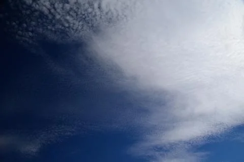 Delicate clouds and blue sky Stock Photos