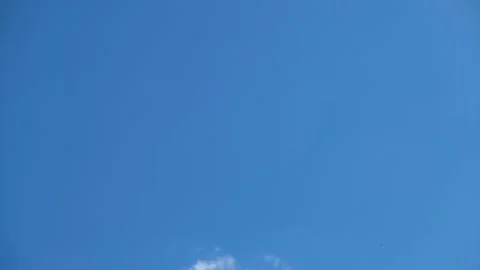 Delicate clouds in the sky. White clouds fly across the blue sky. Stock Footage 197079991