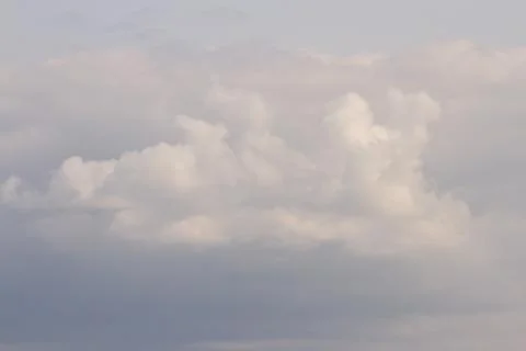 Delicate, cloudy sky before sunset, background, texture. Stock Photos