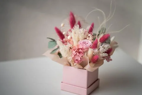 Delicate composition of dry and stabilized flowers Stock Photos