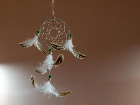 Delicate dreamcatcher featuring white web intricate geometric pattern Stock Photos