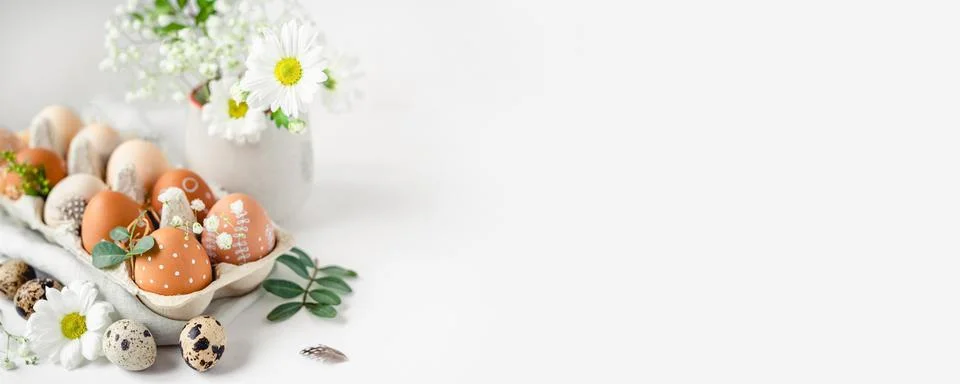 A delicate Easter background with hand-painted eggs Stock Photos