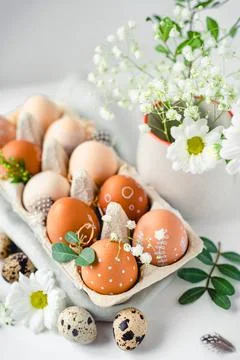 A delicate Easter background with hand-painted eggs Stock Photos
