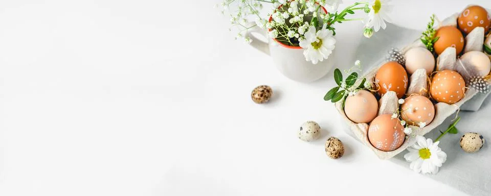 A delicate Easter background with hand-painted eggs Stock Photos