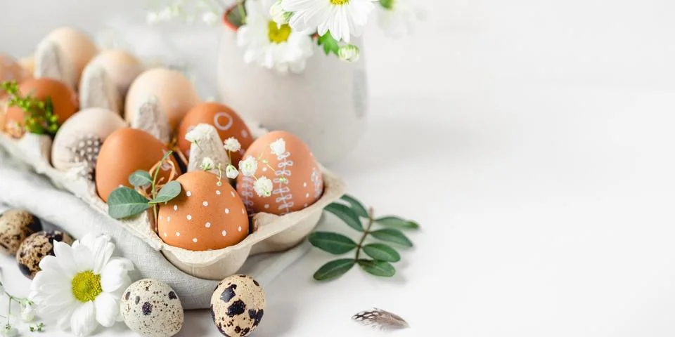 A delicate Easter background with hand-painted eggs Stock Photos