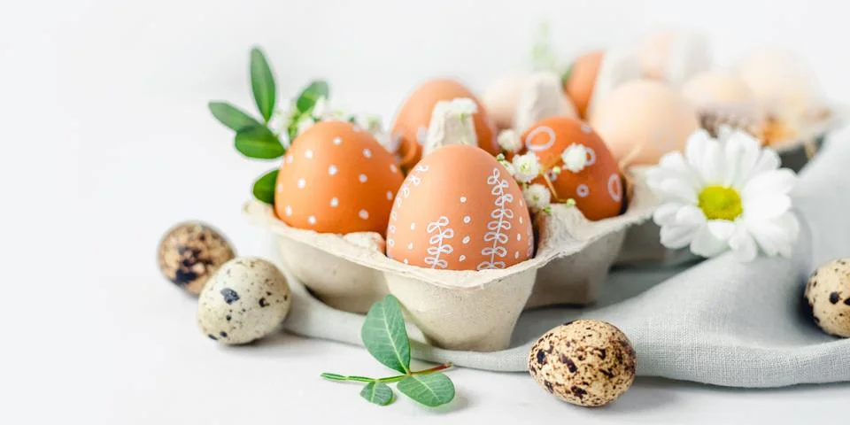 A delicate Easter background with hand-painted eggs Stock Photos
