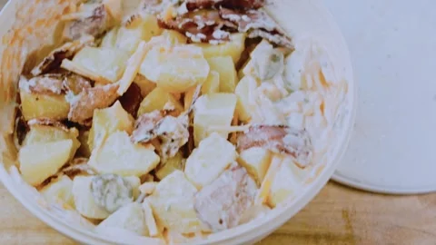 Delicate fine dining angle: arranging the loaded potato salad Stock Footage 342198869