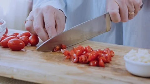 Delicate finished meal angle: adding walnuts and spices to the sauce Stock Footage 342200974
