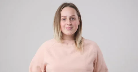 Delicate girl posing on camera Stockbeeldmateriaal 142163949